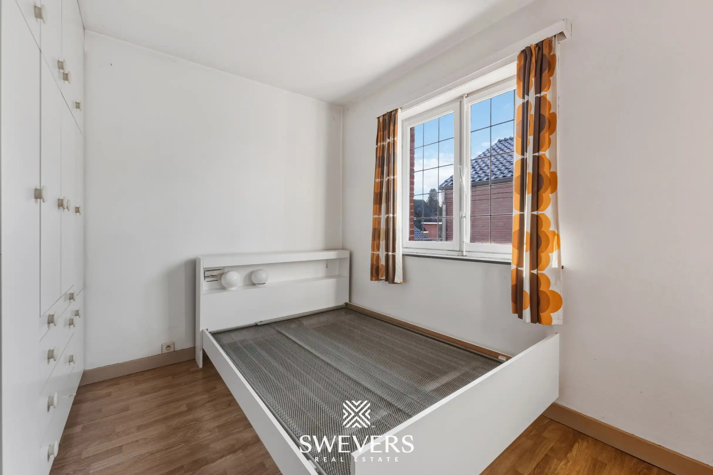 Vrijstaande woning met drie slaapkamers, bureauruimte en tuin in Houthalen foto 18