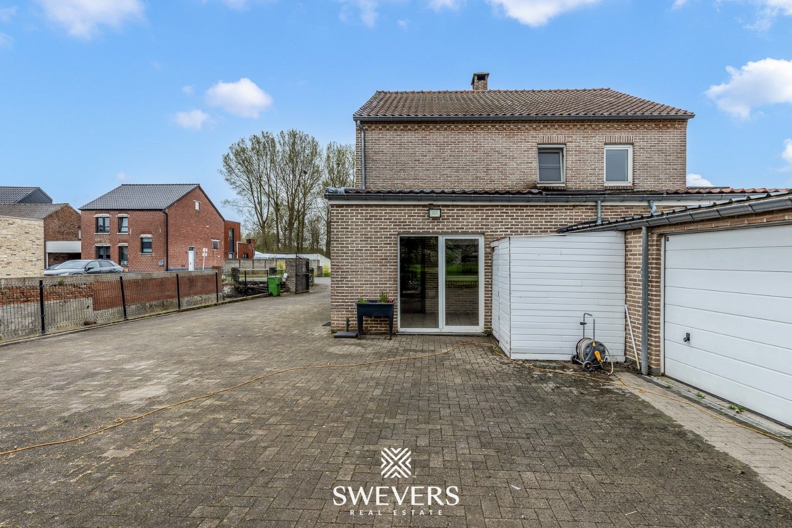 Gezellige woning met veranda, garage & zonnige tuin foto 25