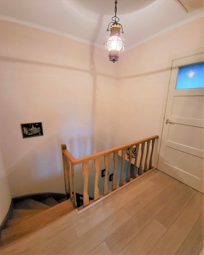 Halfopen bebouwing met garage en schitterende tuin. foto 12