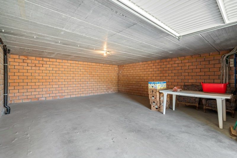 Gelijkvloers appartement met 2 slaapkamers, zonnig terras en een zeer ruime garage! foto 14