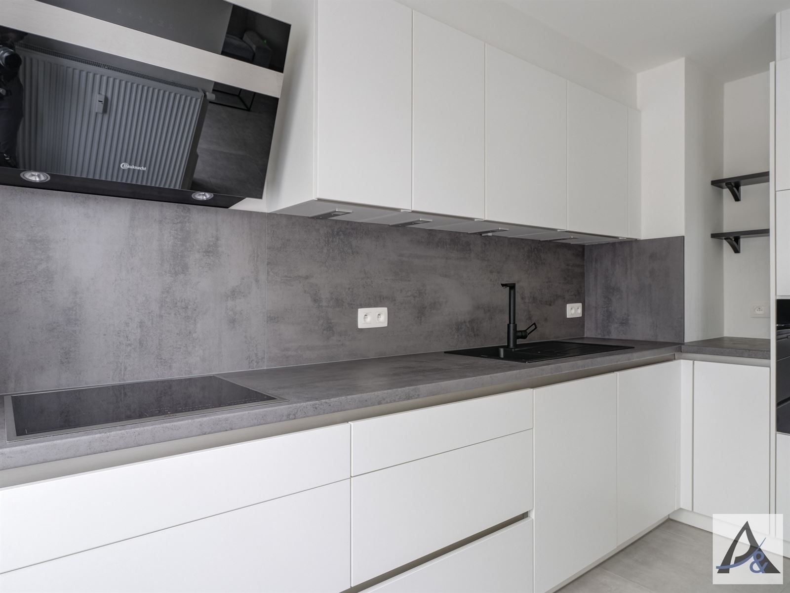 Instapklaar gelijkvloers appartement in hartje Bilzen met garage foto 11