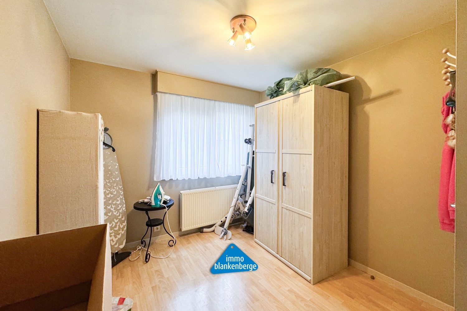 Ruim gelijkvloers appartement met voortuin en autostaanplaats foto 15