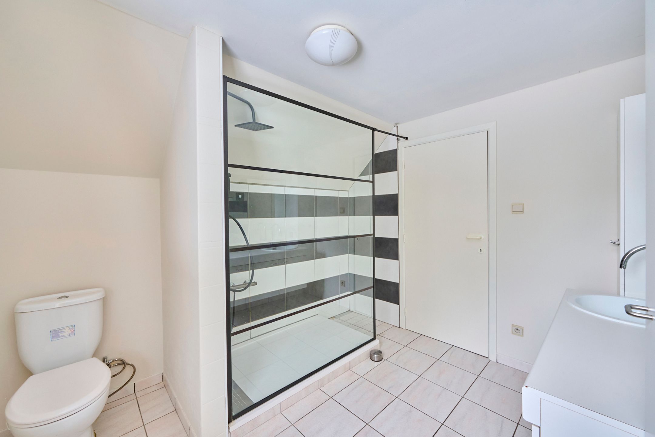 Zeer ruime en eigentijdse gezinswoning op 11a  foto 14