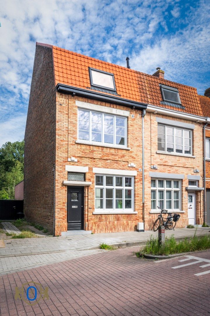 Charmante halfopen 3-slpkr woning met tuin foto 2