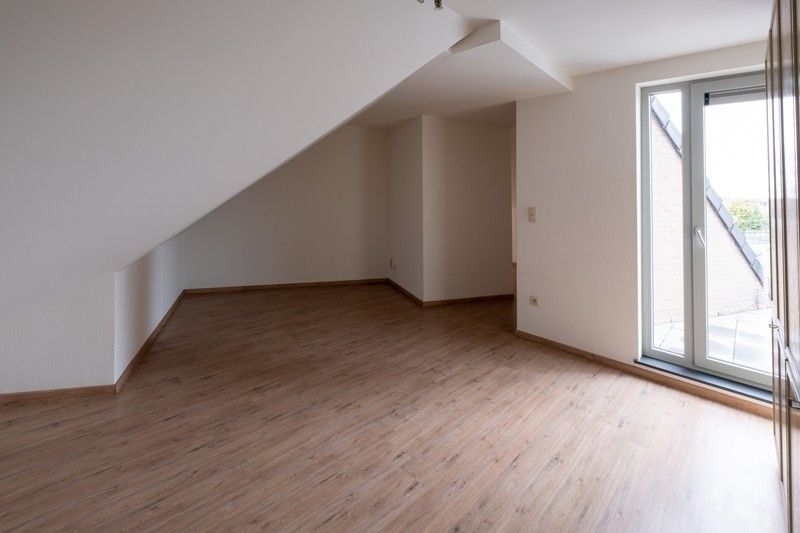 Ruim en luxueus appartement met 2,5 slaapkamers, 3 terrassen en 2 parkings in hartje Diepenbeek! foto 21