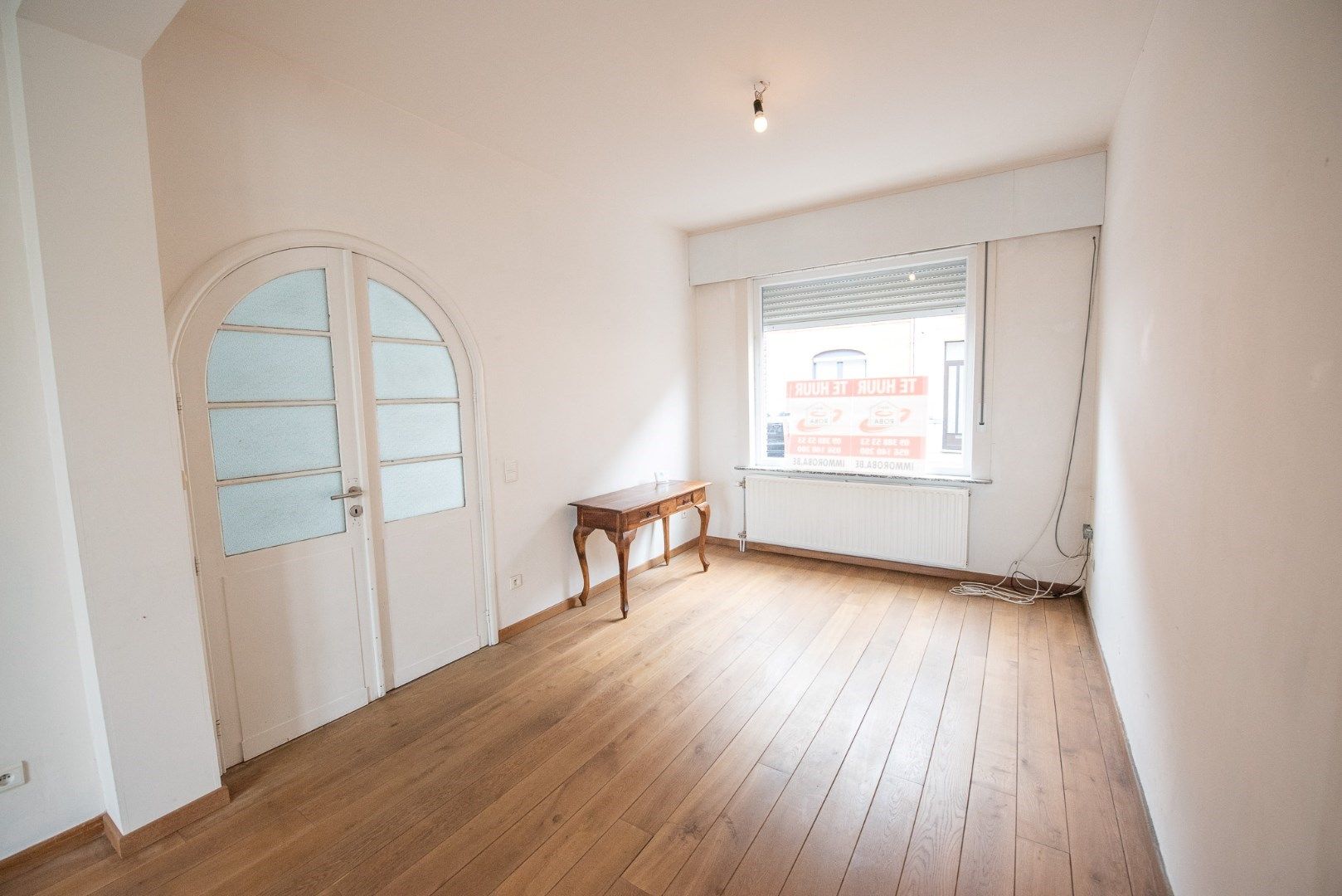 Gerenoveerd woning te huur in het centrum van Waregem! foto 5
