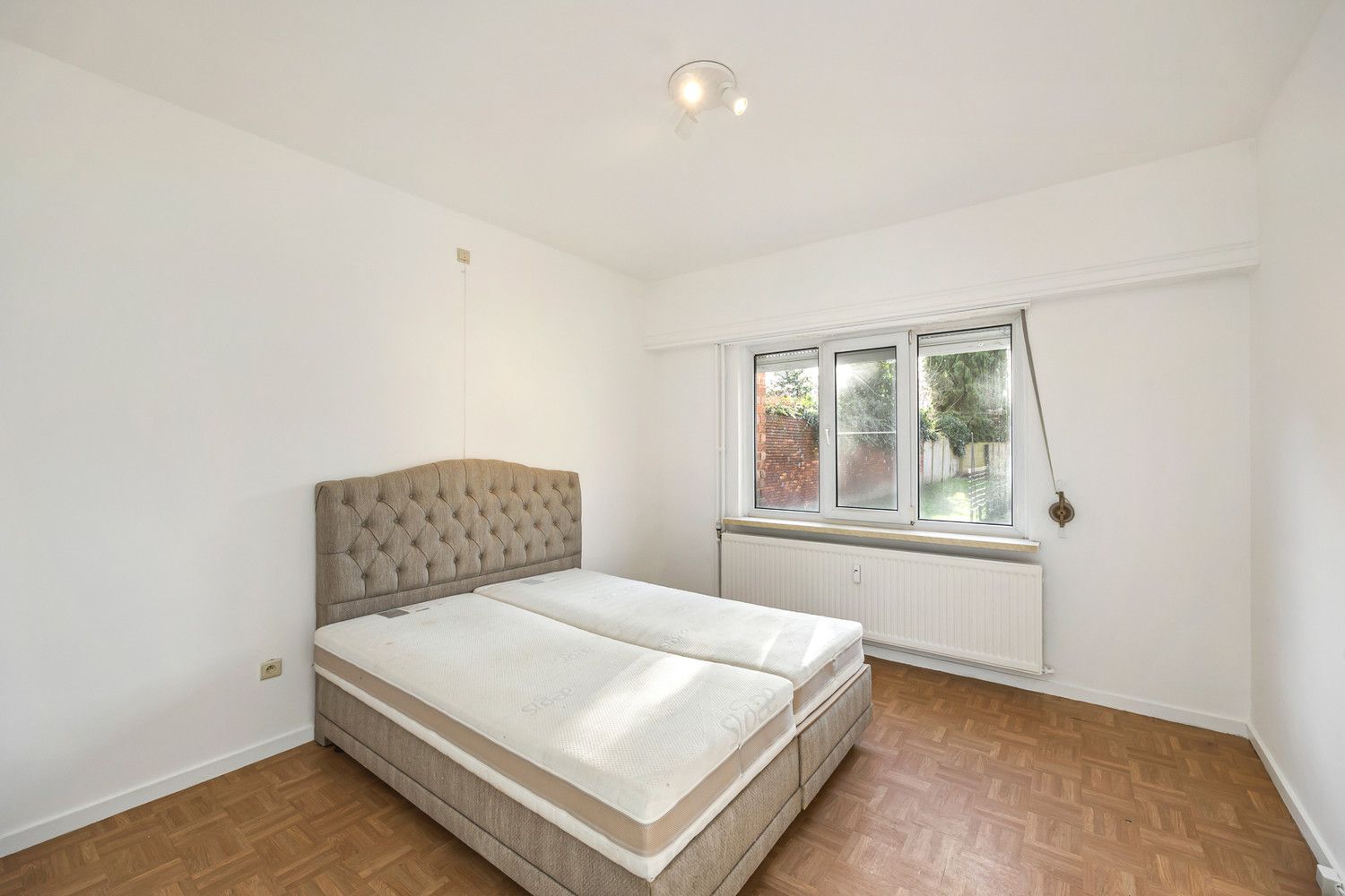 2-slk gelijkvloers appartement met aanzienlijke Z-tuin vlakbij het Te Boelaerpark foto 9