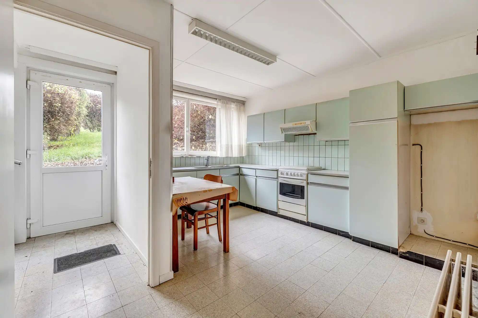 Te renoveren woning op 12a 80ca gelegen in centrum van Gooik foto 4