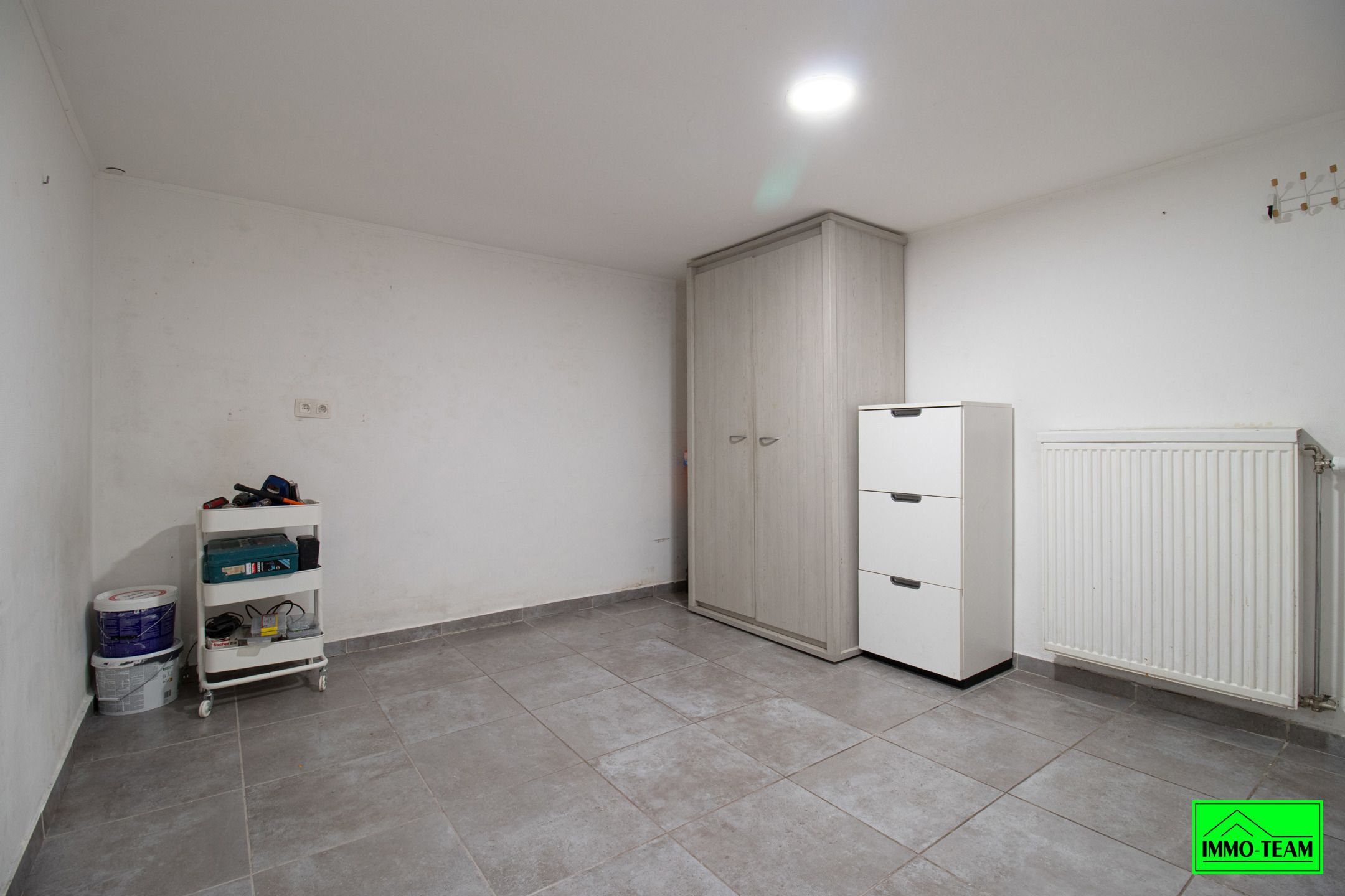 Opbrengsteigendom met handelszaak en 2 duplexappartementen foto 3