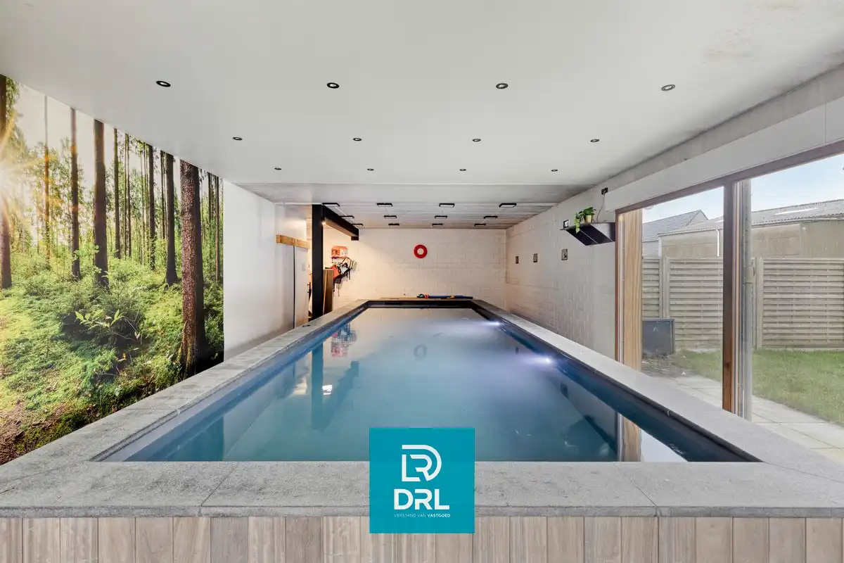 Luxe woning met binnenzwembad en perfect afgescheiden handels- of verhuurgedeelte foto 15