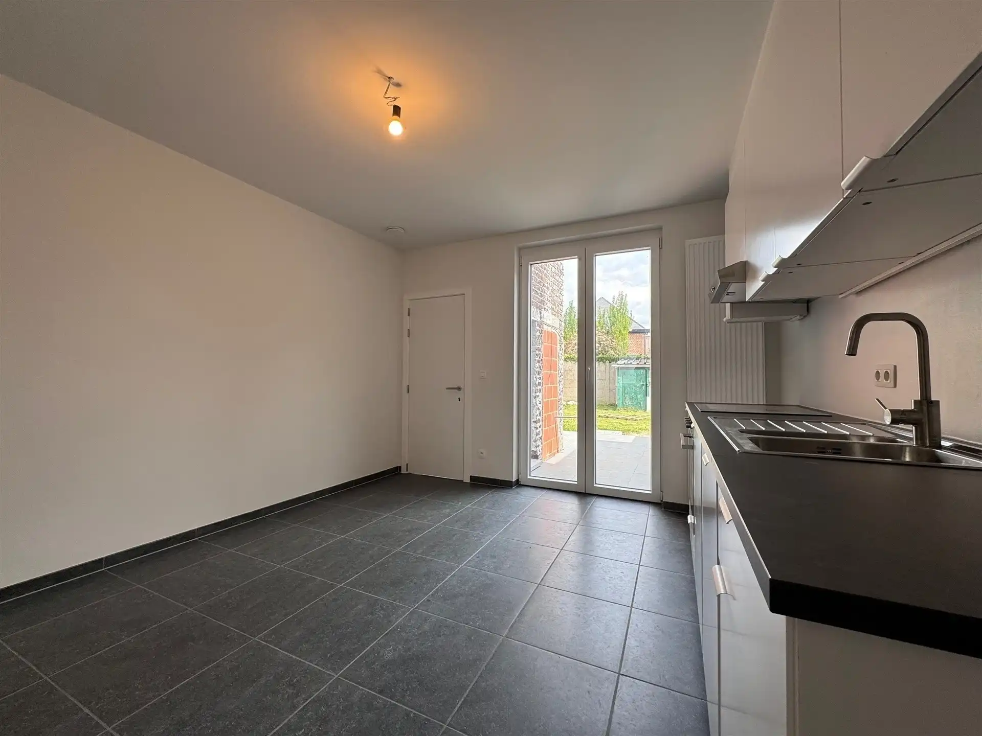 Gunstig gelegen woning met 4 slaapkamers en tuin. foto 10
