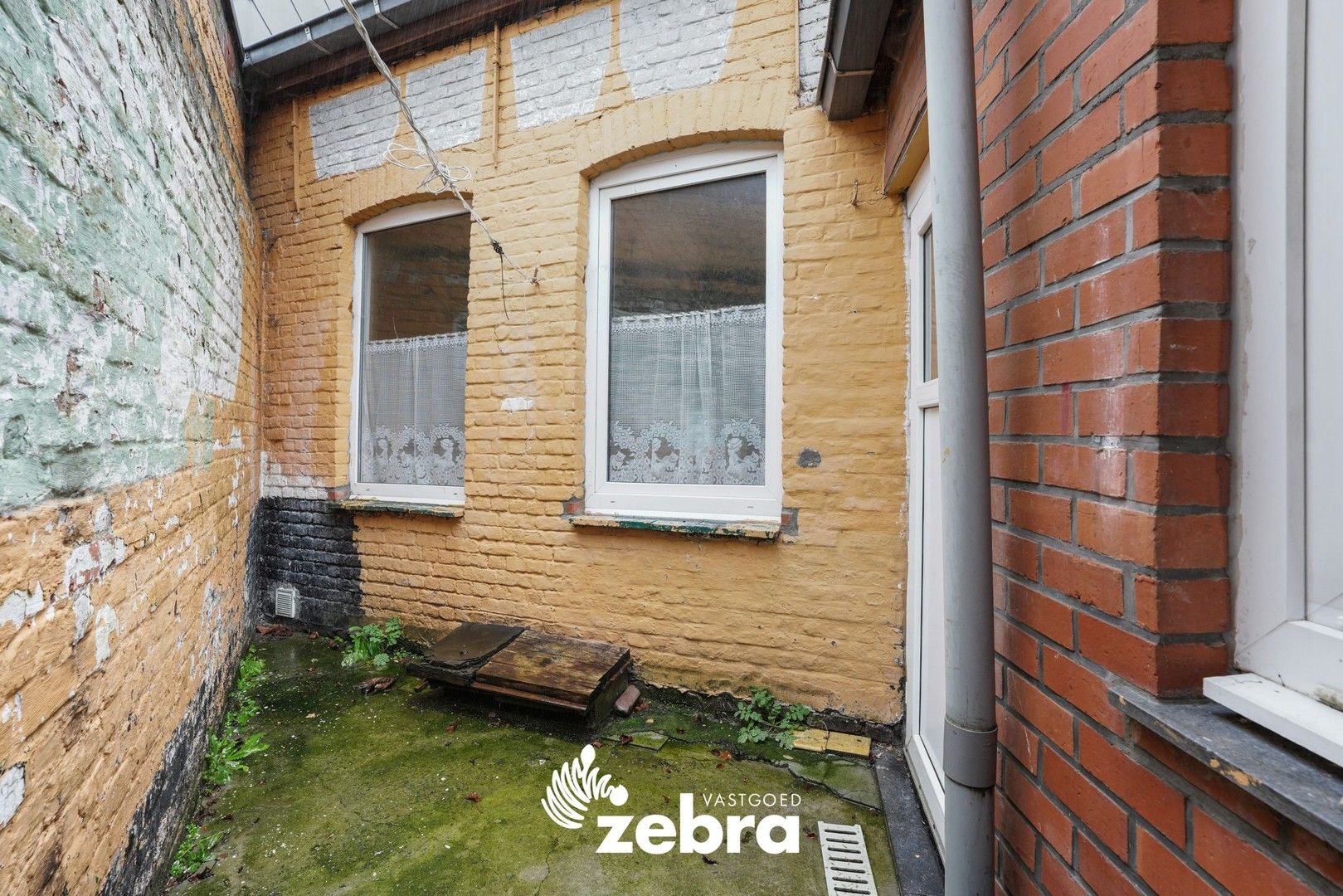 Deels gerenoveerde woning met twee slaapkamers te centrum Tielt! foto 13