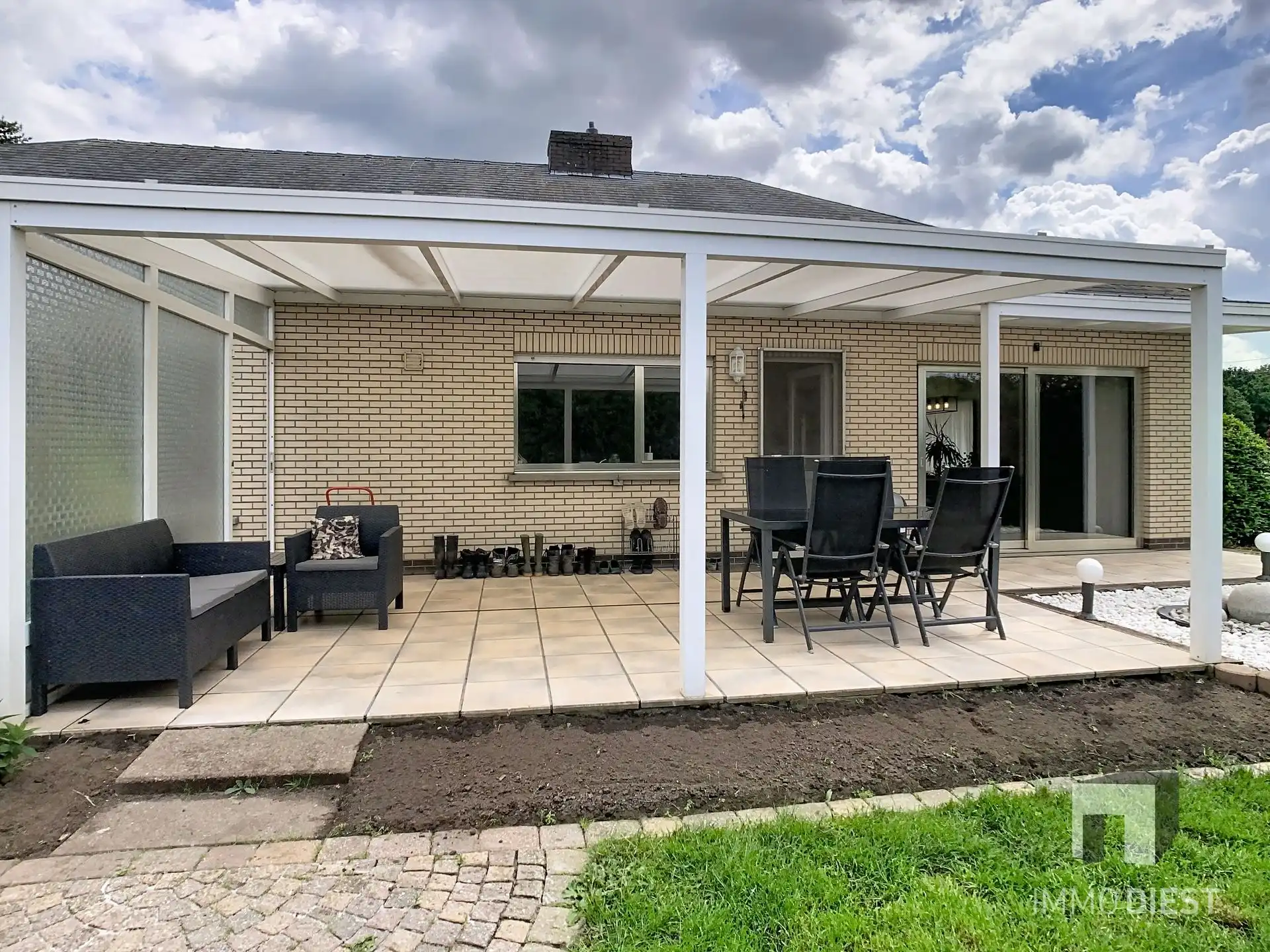 Gelijkvloerse instapklare woning met grote tuin op ca. 39a foto 5