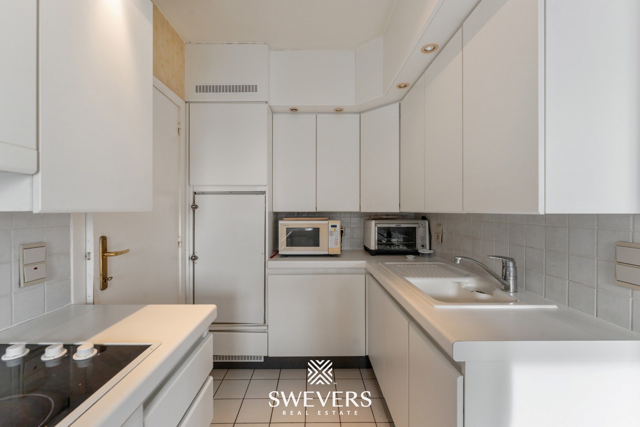 Ruim appartement met 3 slpk en veel lichtinval in Borgloon foto 8