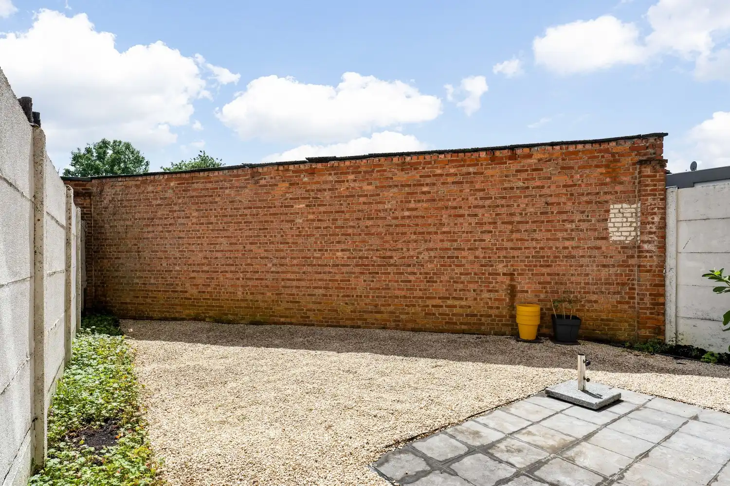 Instapklaar gelijkvloers appartement met zonnige tuin foto 16