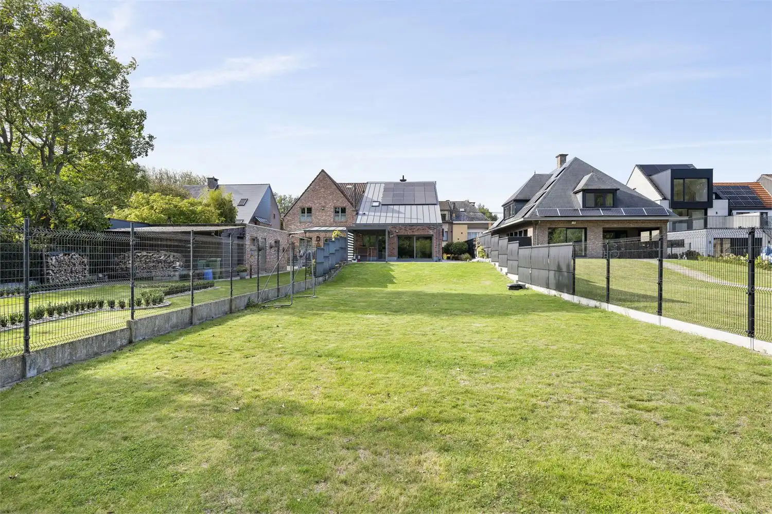 DE IDEALE GEZINSWONING MET ZALIGE TUIN OP EXCLUSIEVE LIGGING DOODLOPENDE STRAAT foto 9