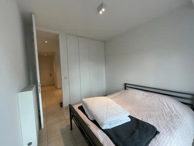Instapklaar modern appartement met 2 slaapkamers en garage foto 14