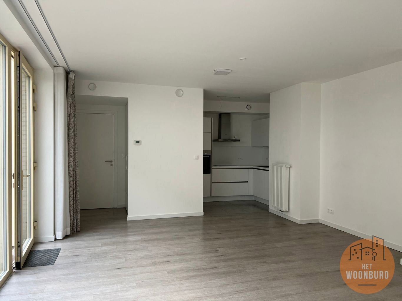 Gelijkvloersappartement met tuin, kelder en parkeerplaats foto 2