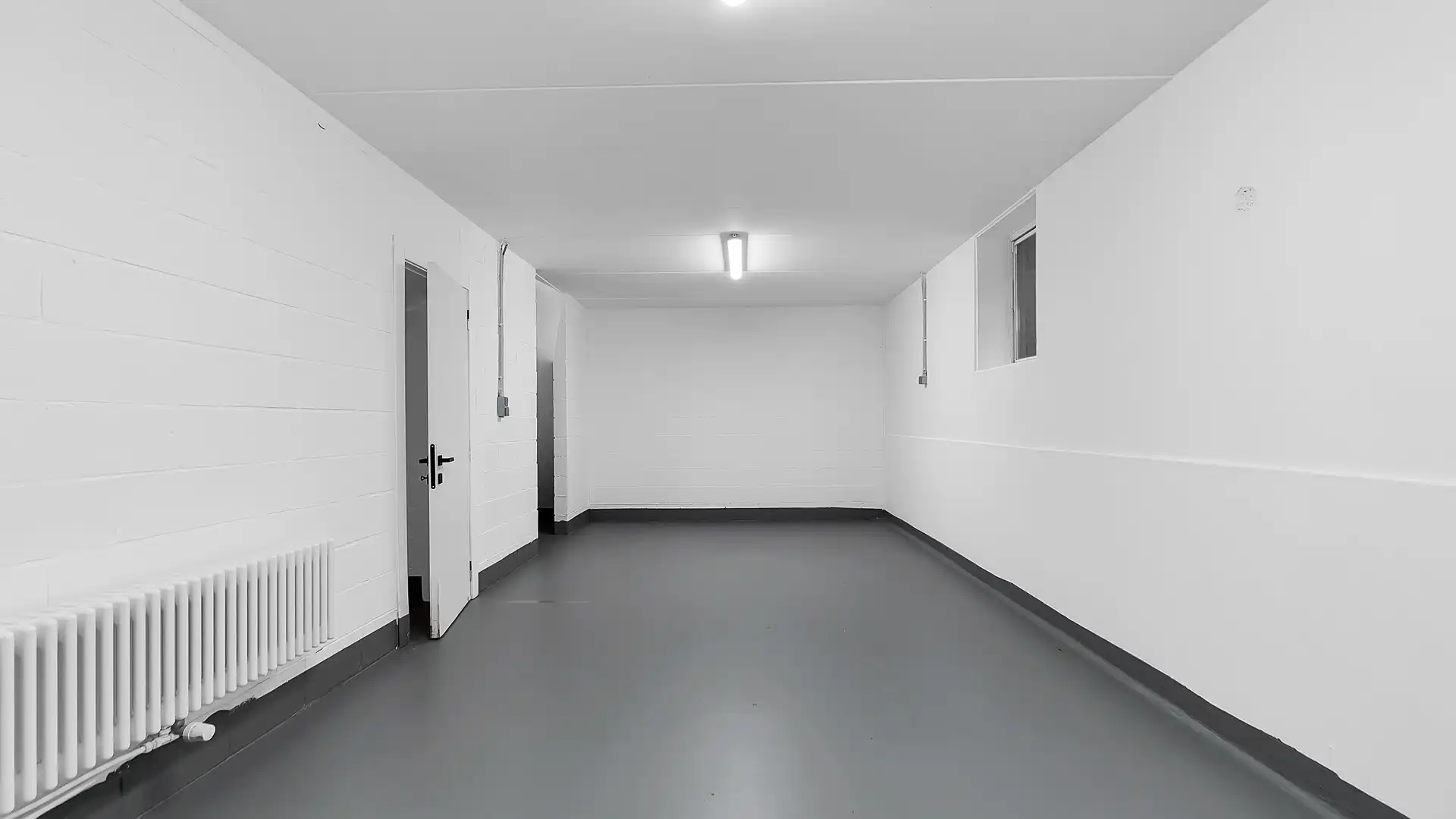 Gelijkvloers appartement met privatieve tuin, volledige onderkelderd en uitzonderlijk gunstig EPC foto 13