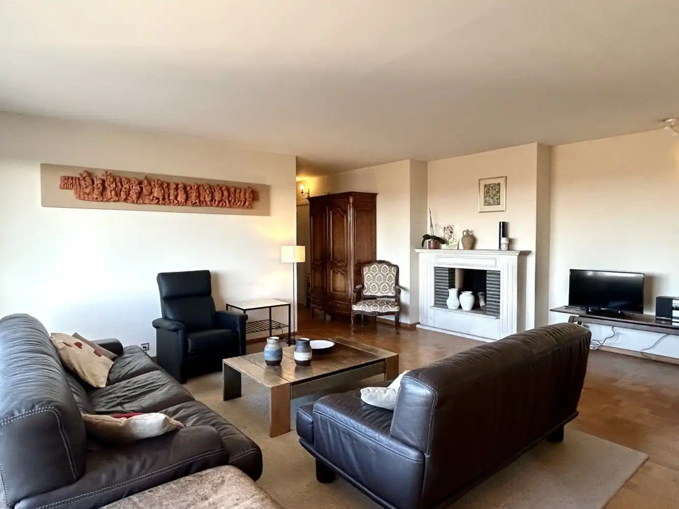 Ruim 3-kamerappartement met garagebox en autostaanplaats foto 3