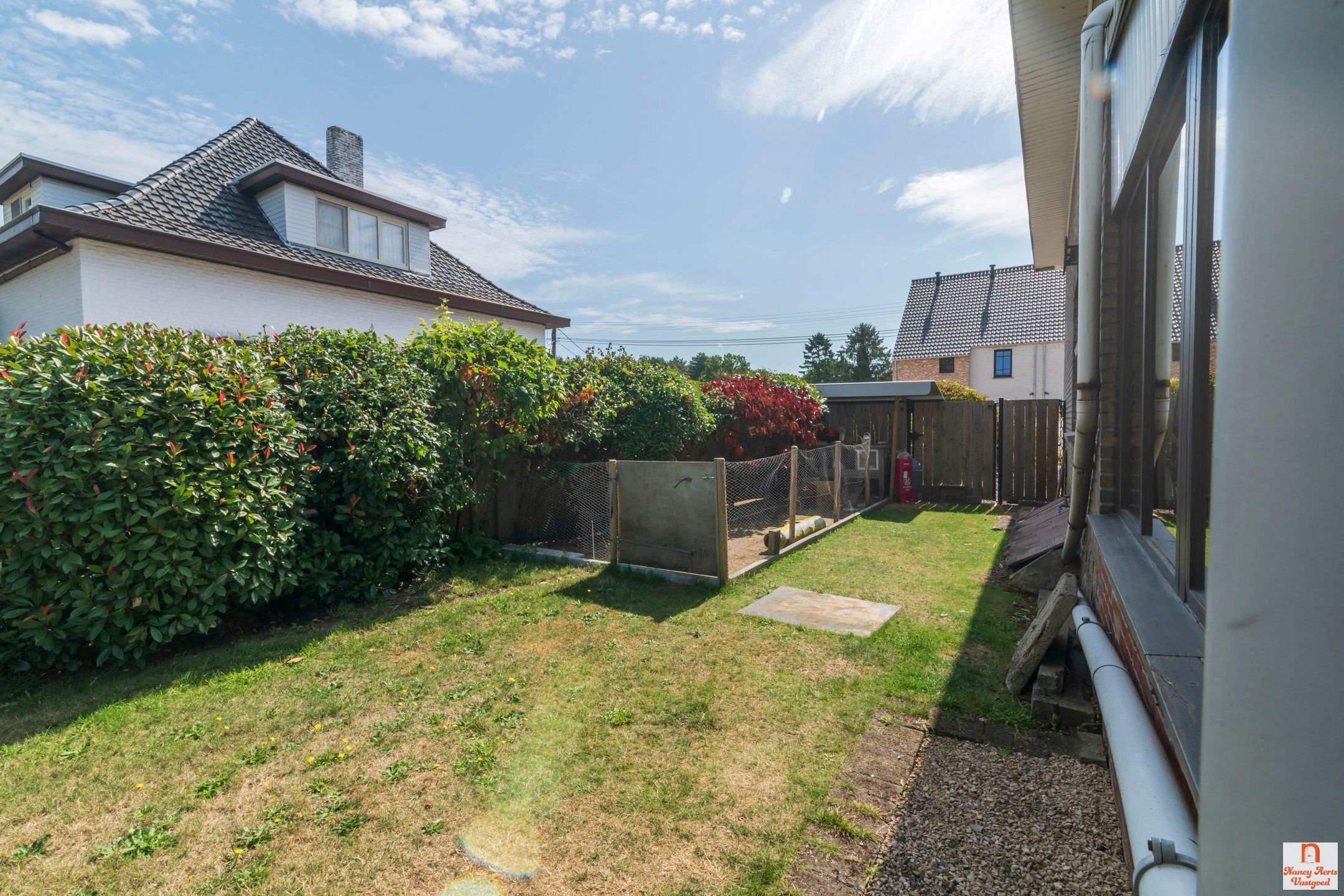 Sfeervolle jaren ’60-woning met grote tuin in rustige straat foto 50