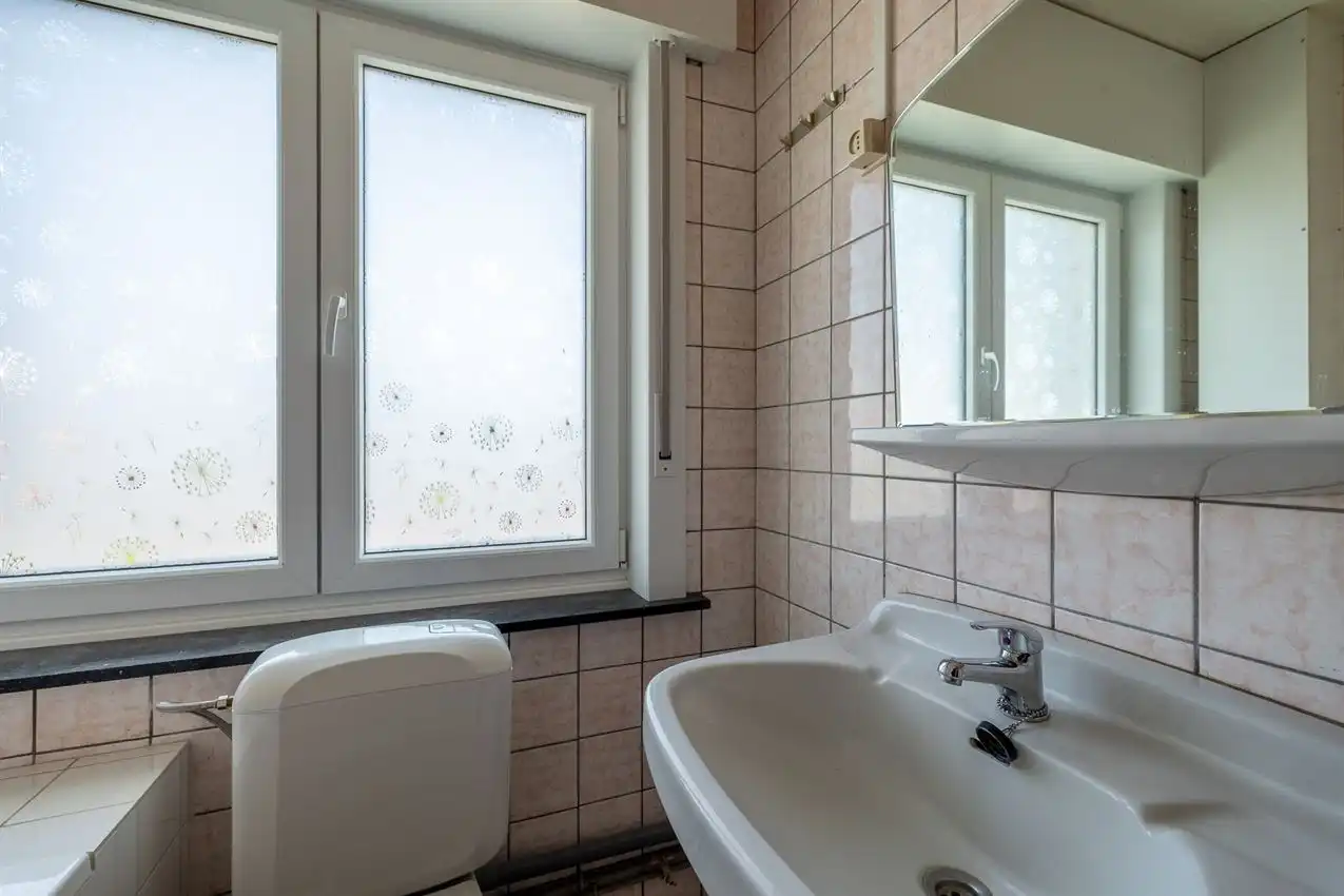 Karaktervolle woning met grote tuin, bijgebouwen en uitbreidbaar zoldervolume op een verrassend diep perceel foto 22