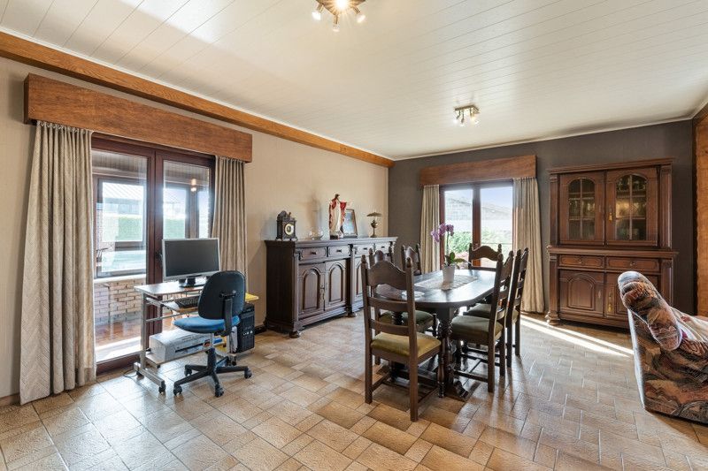 Gelijkvloerse woning met grote loods achteraan op 25are foto 9