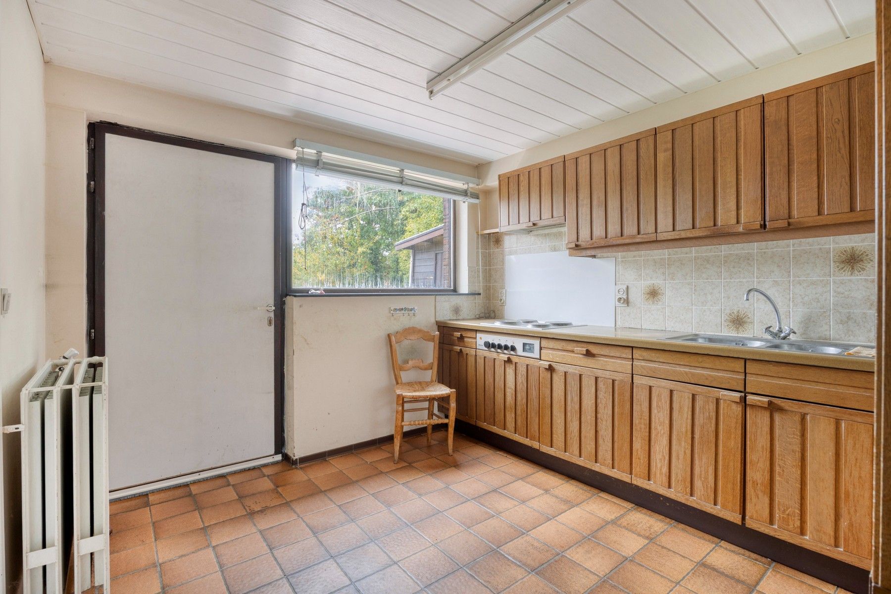 In de geliefde Tweebunderswijk woning met 4 slaapkamers, garage en tuin foto 12