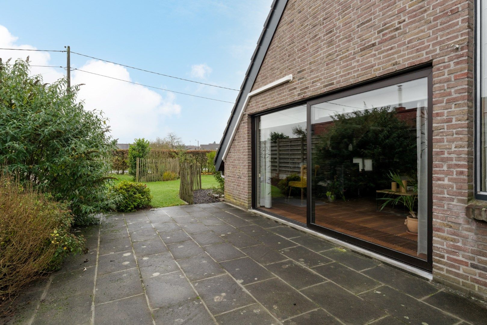 Instapklare woning met een aangename en verzorgde tuin te koop! foto 25