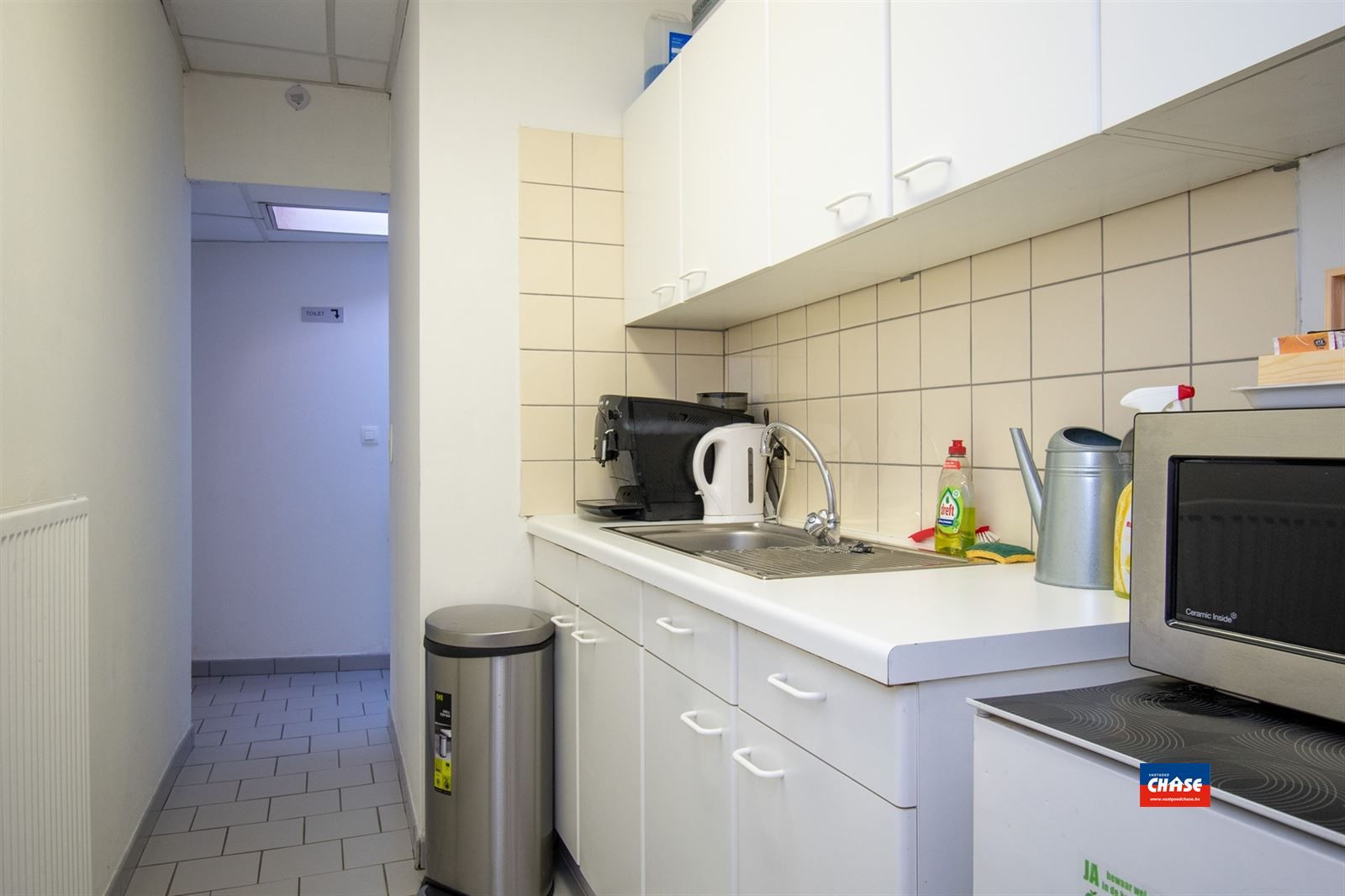 Gebouw met 3 praktijkruimtes en duplexappartement foto 17