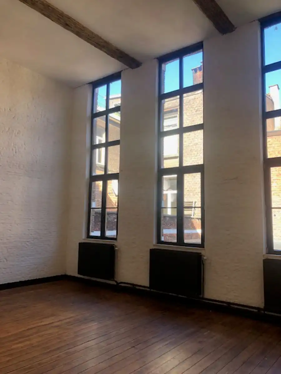Uniek commercieel gebouw te huur met privatieve stadstuin foto 6