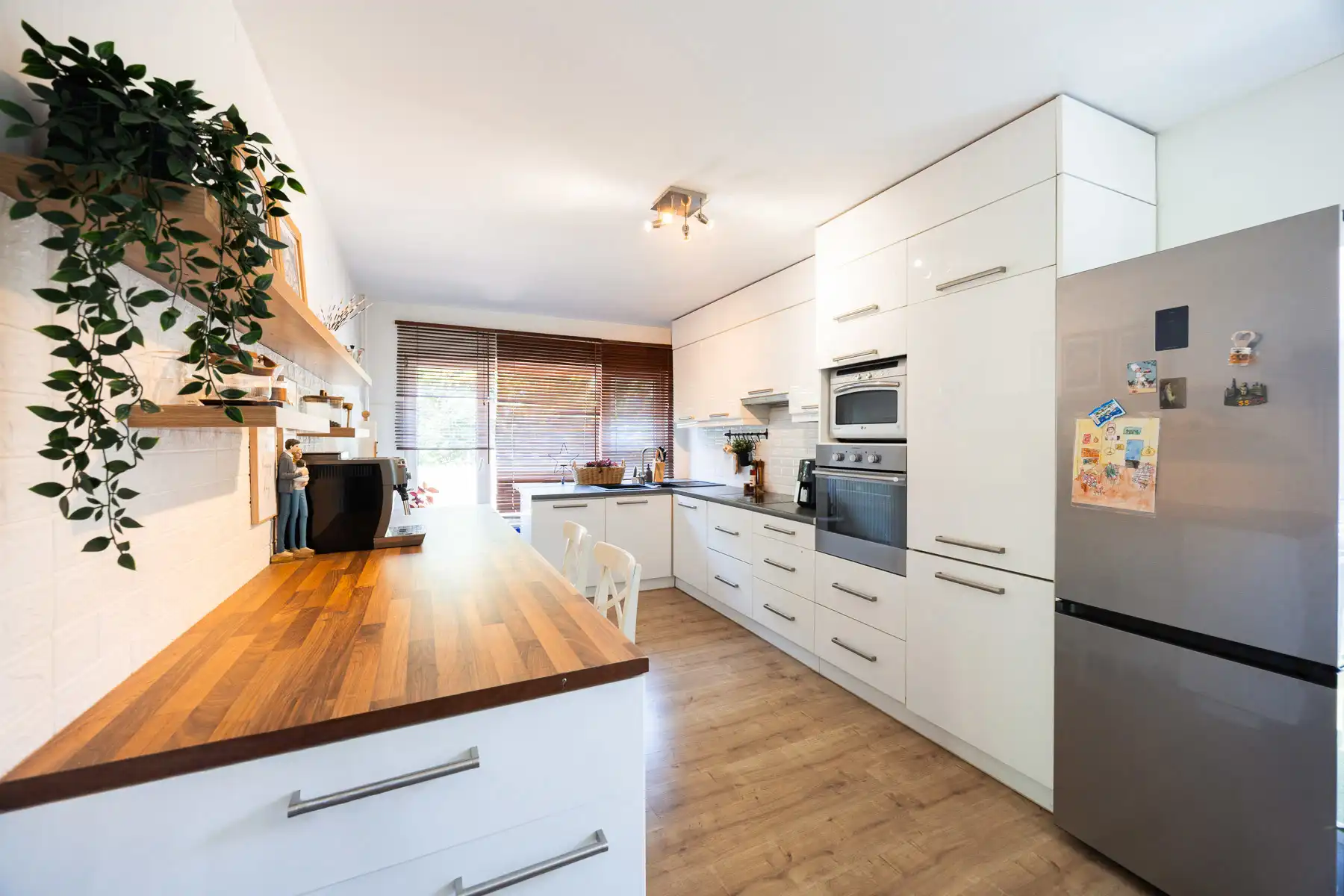 Gerenoveerd en energiezuinig duplex-appartement met parkings foto 6