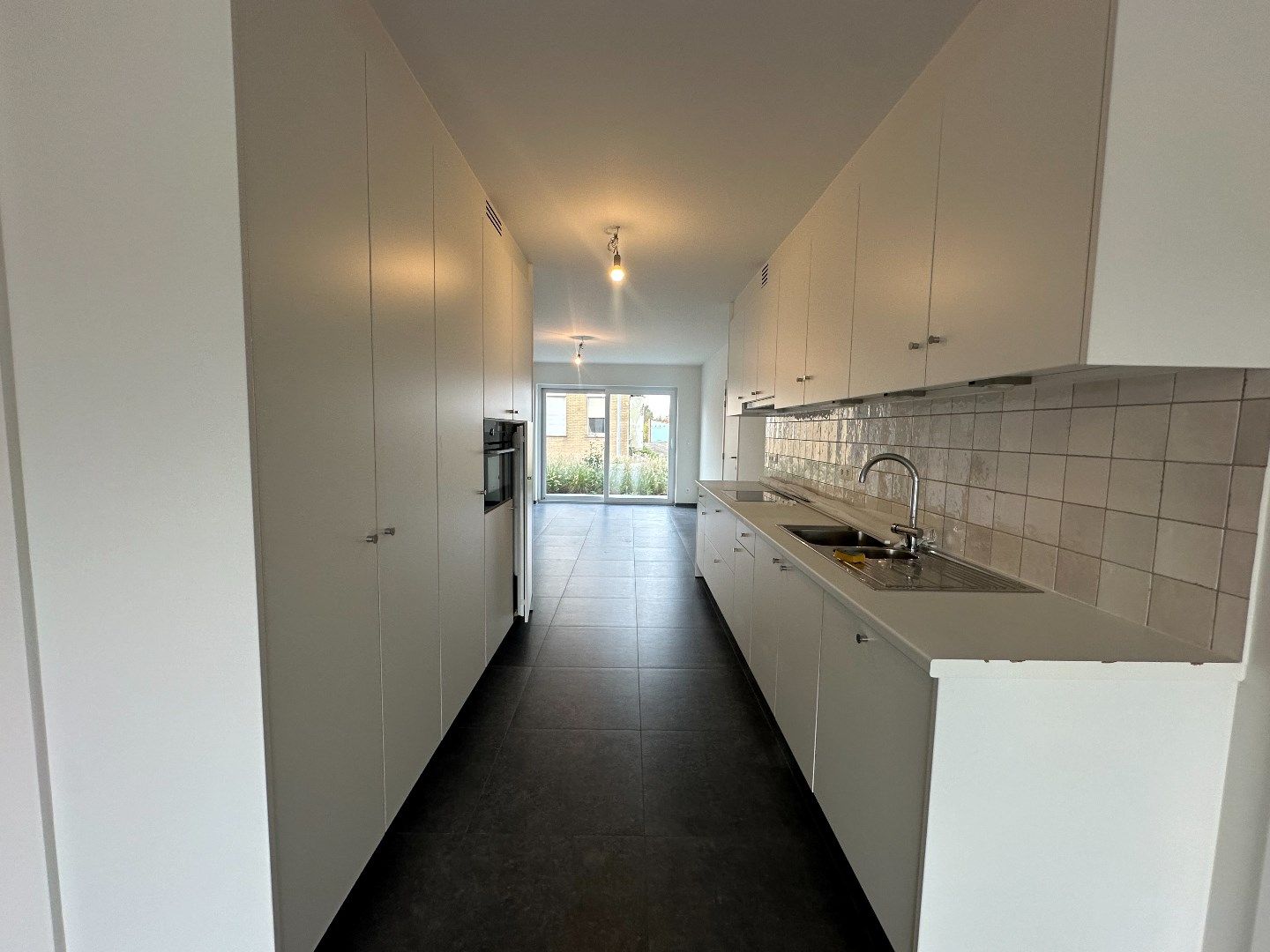 Ruim duplex-appartement met 3 slaapkamers en tuin te Werken foto 3