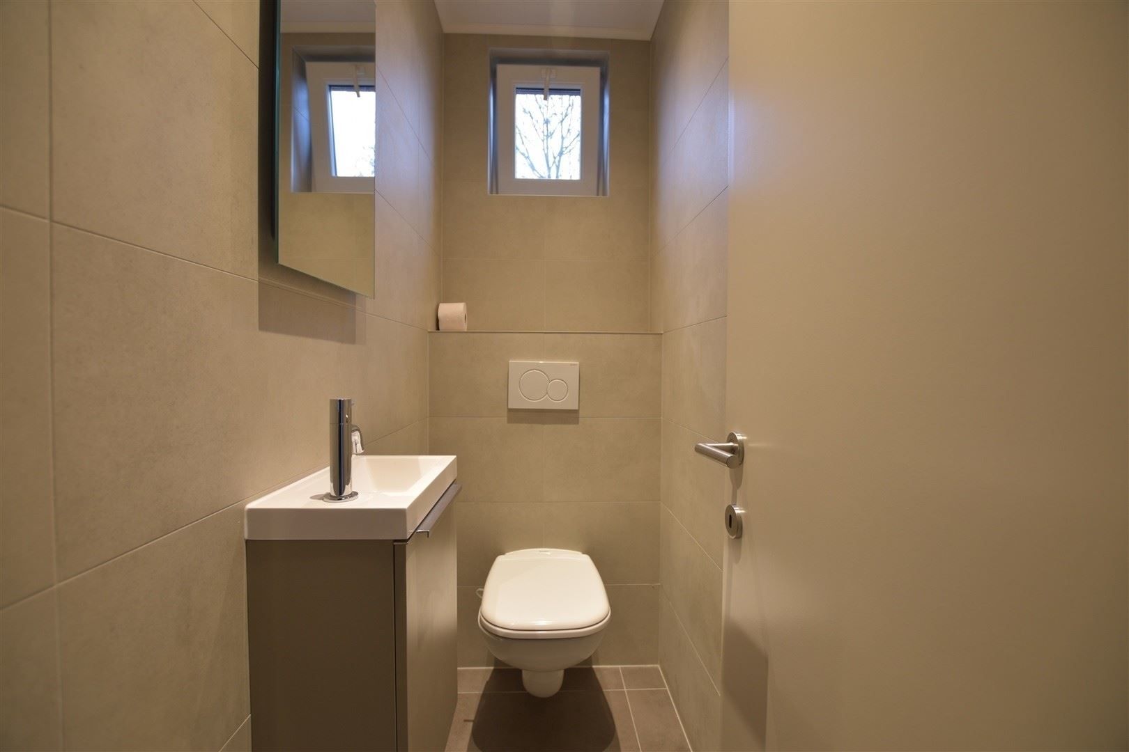 Totaal gerenoveerd GV appartement met tuin te Grembergen foto 22