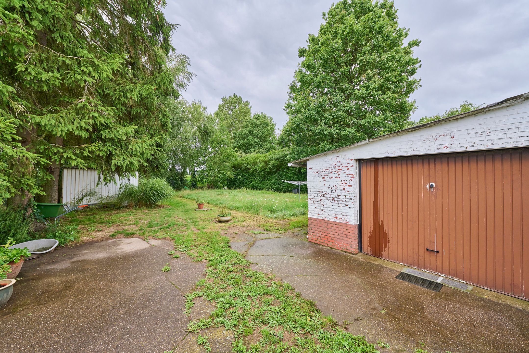 Prachtig bouwgrond met bestaande woning in het groen foto 15