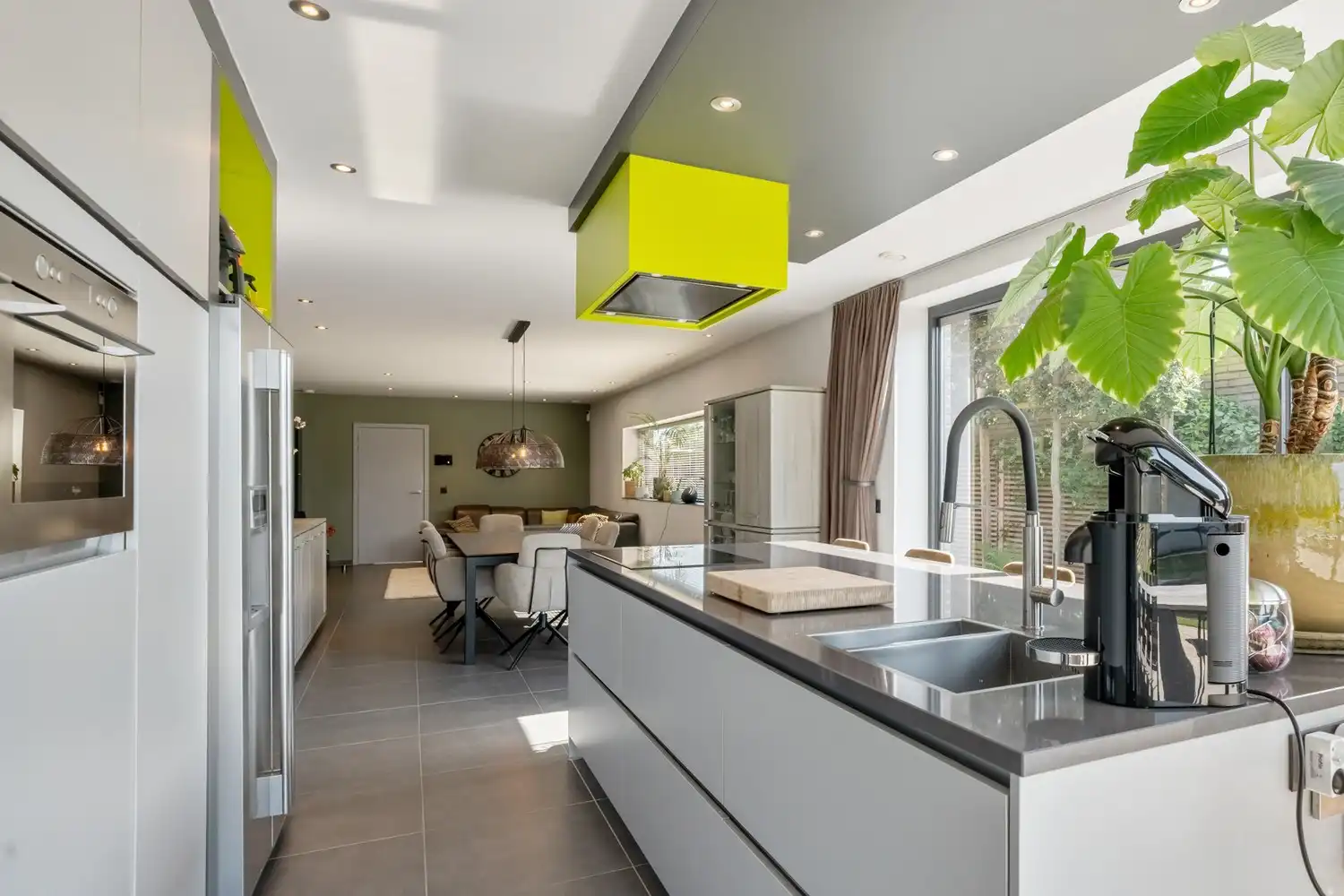 Instapklare en energiezuinige halfopen bebouwing met zuidgerichte tuin en vrij uitzicht op het groen! foto 8