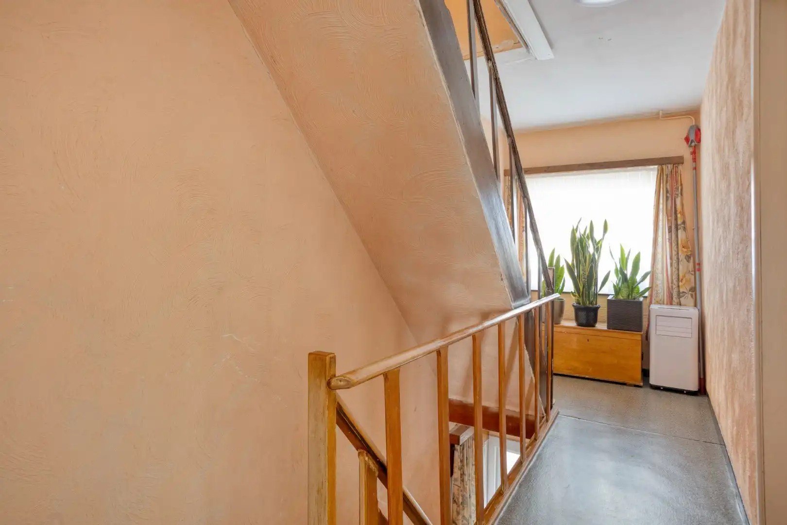 Woning met diepe tuin, garage en vernieuwd geïsoleerd dak, centrum Borgloon foto 14