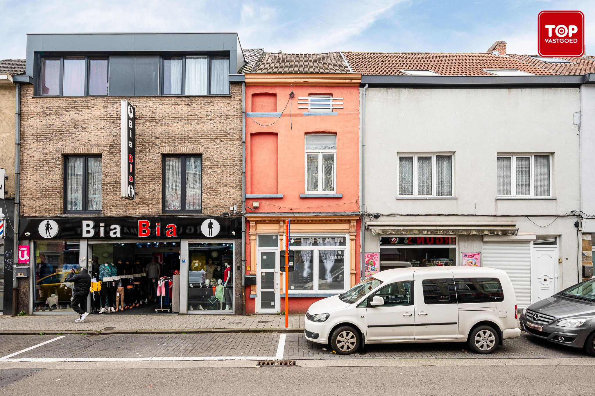 Stadswoning met 4 slaapkamers in een levendige winkelstraat. foto 25