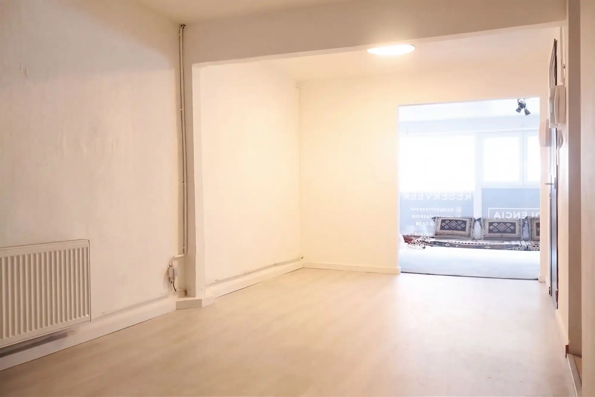 Dubbel commercieelpand in een bruisende winkelstraat foto 6