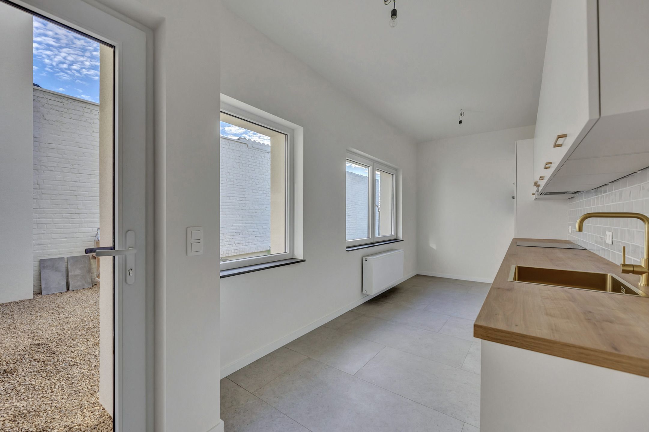 Volledig gerenoveerde woning met 4 slpks en tuin foto 10