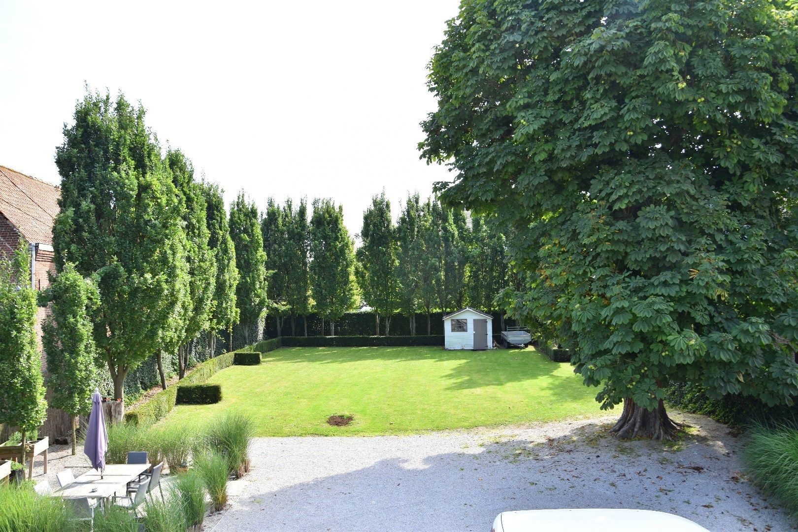 Unieke eigendom met 5 slaapkamers, groot terras én zonnige tuin in het centrum van Gullegem foto 16