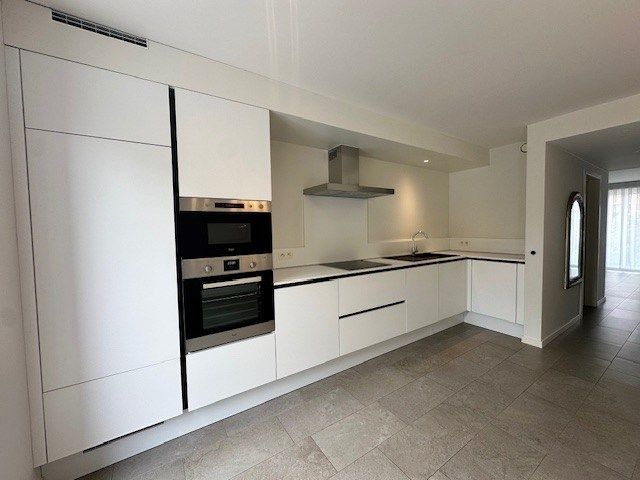 Charmant triplexappartement te huur in het hart van de dorpskern in Neeroeteren. foto 5