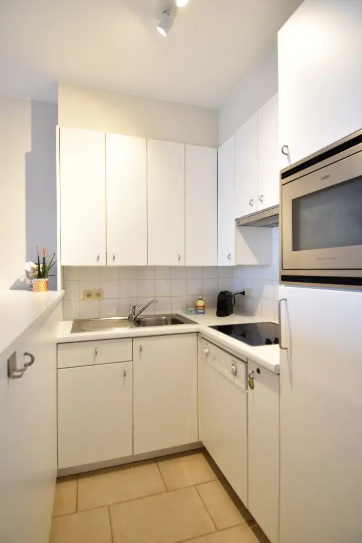 Appartement met frontaal zeezicht op de zeedijk in Nieuwpoort foto 12