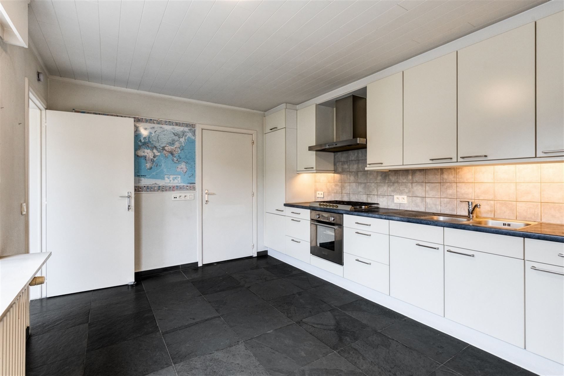 Moderne, zéér praktische woning met leuke tuin! 3 Slpks. foto 7