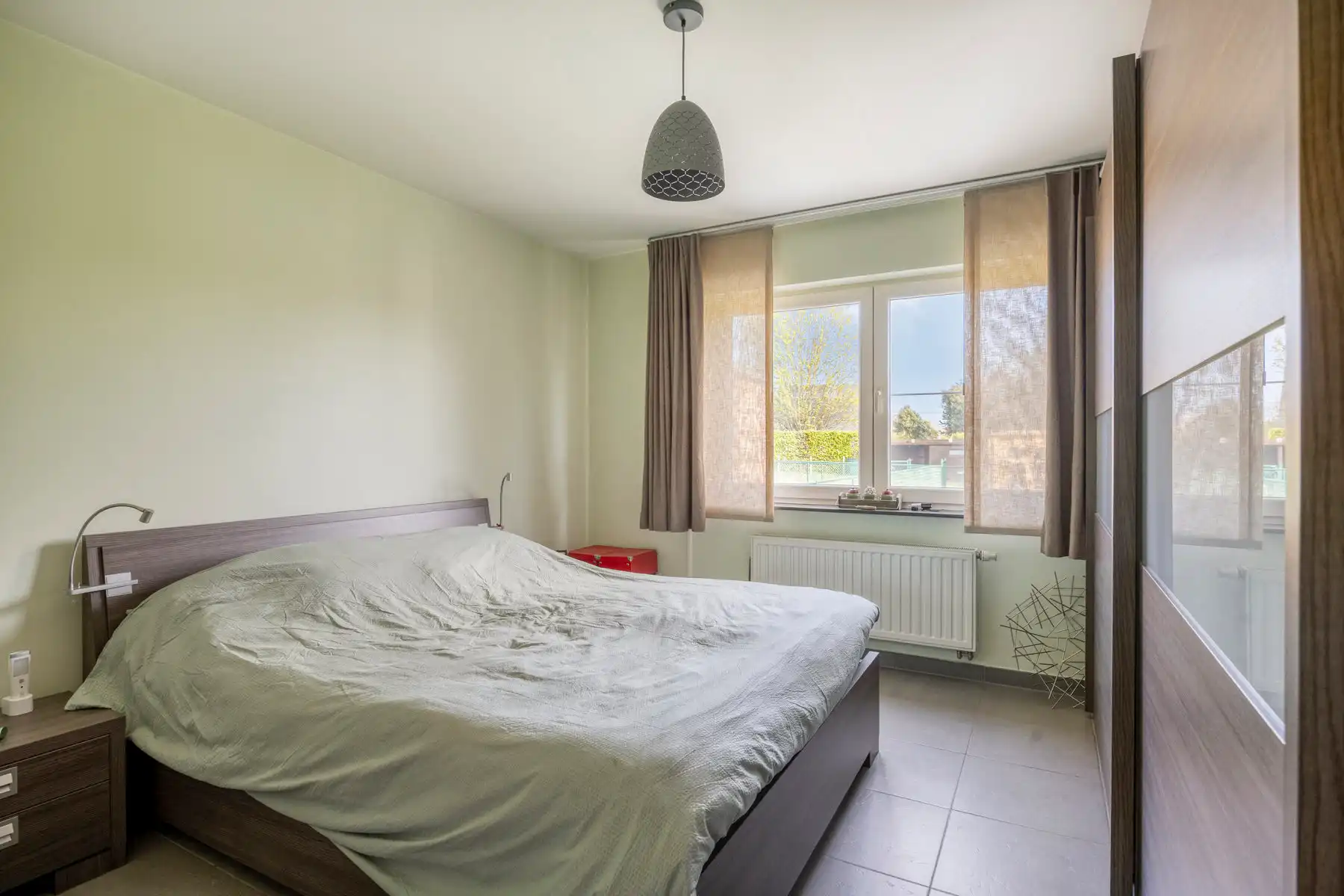 Gelijkvloers appartement met 2 kamers, tuin en garage foto 11
