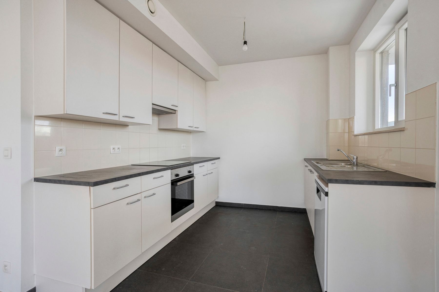 Leemans Immobiliën biedt u dit energiezuinige appartement aan met een adembenemend uitzicht over Brussel. foto 9