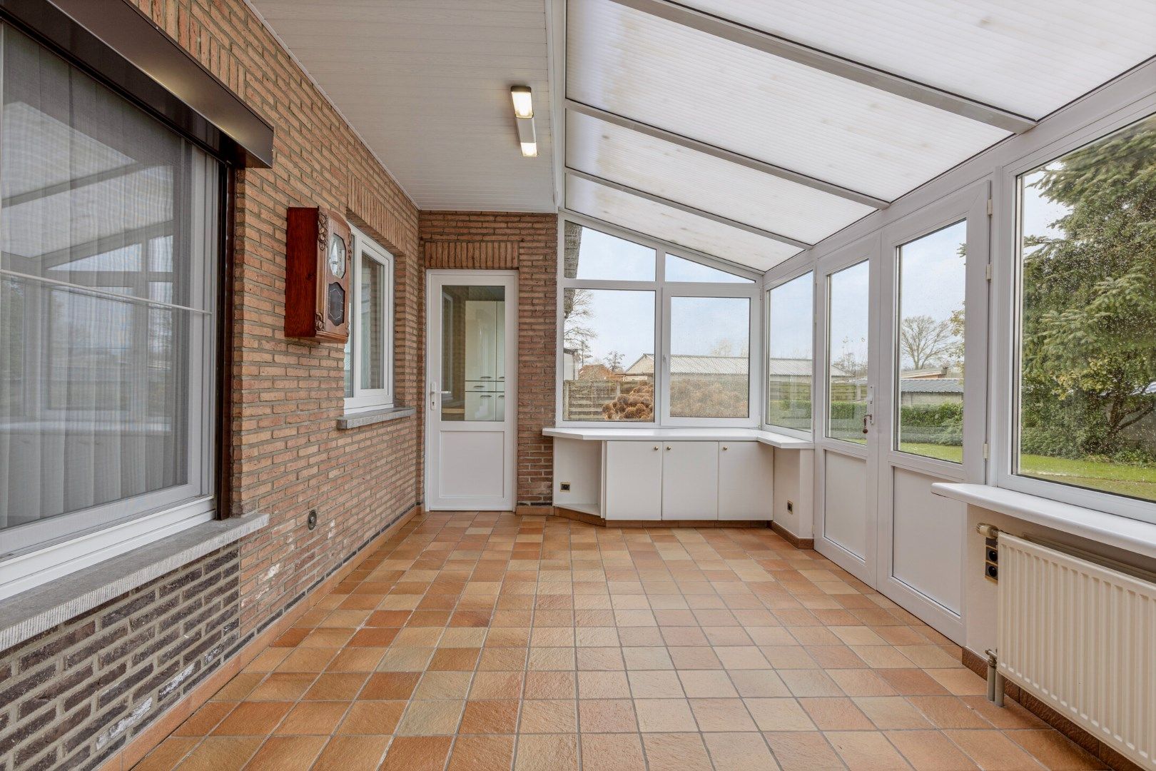 Goed onderhouden woning met 3 slpks op een mooi perceel van 25 are. foto 9