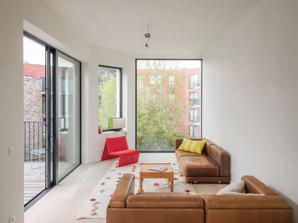 Uniek townhouse-appartement met o.m. 4 slaapkamers, 3 badkamer en een ruim terras. foto 9