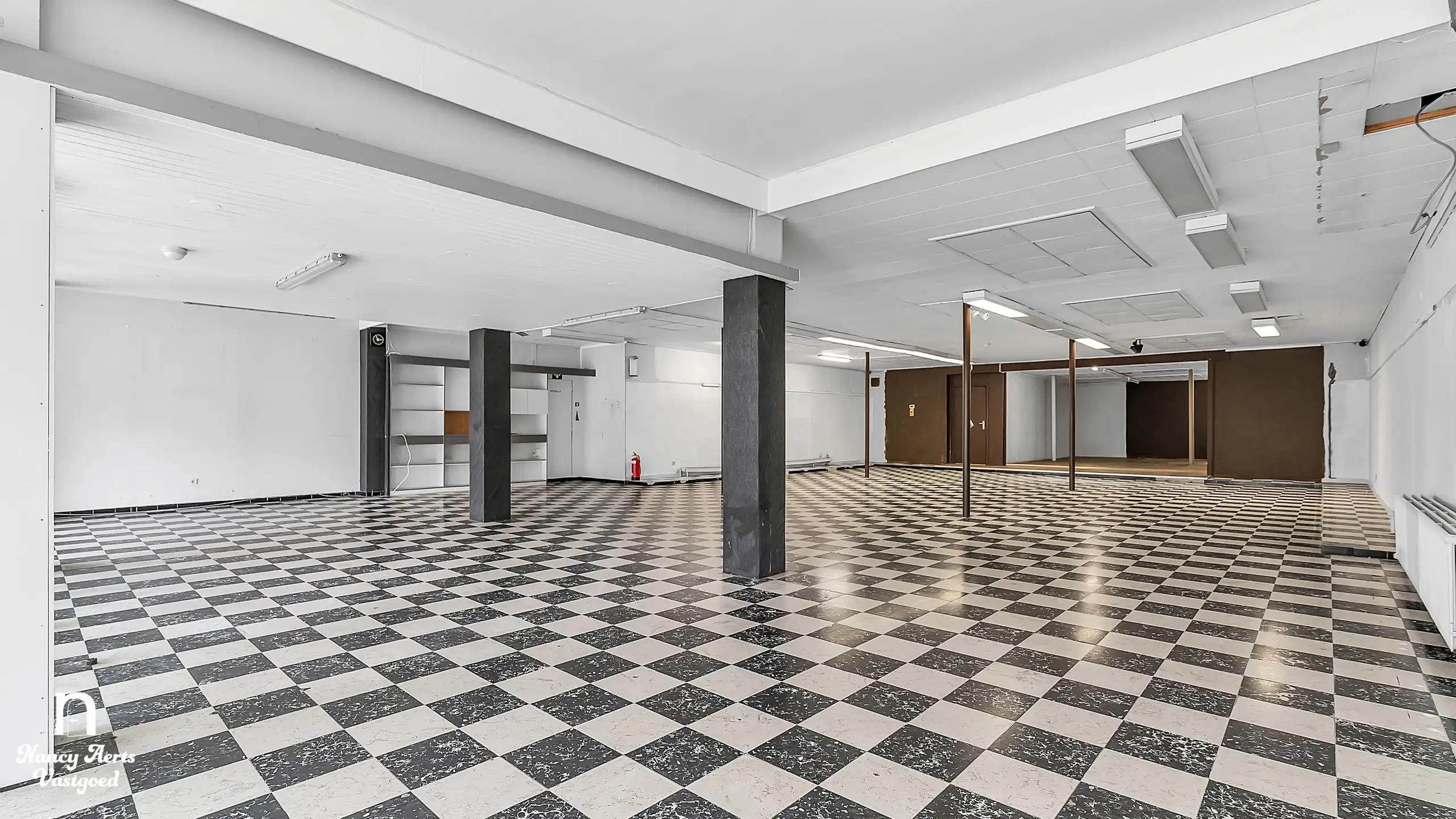 Handelspand van 395 m² in het centrum van Beringen foto 4