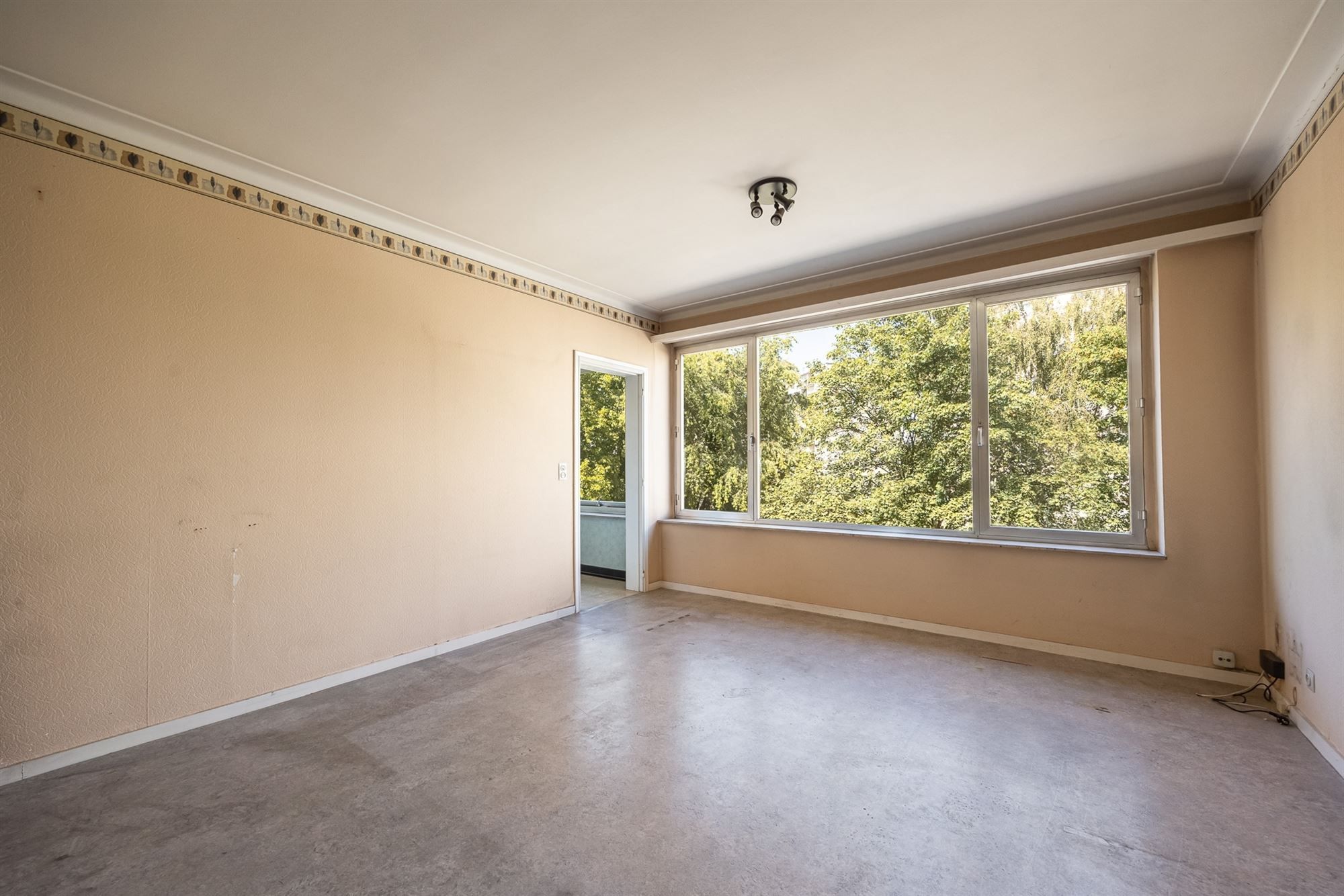 Op te frissen appartement met zuidgericht terras foto 3